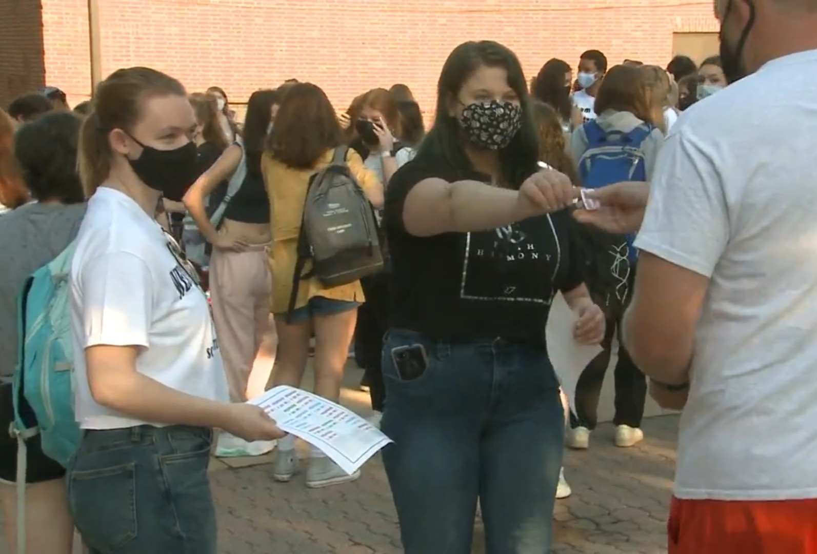 2021-08-27 Cate on TV Protesting dress code.jpg